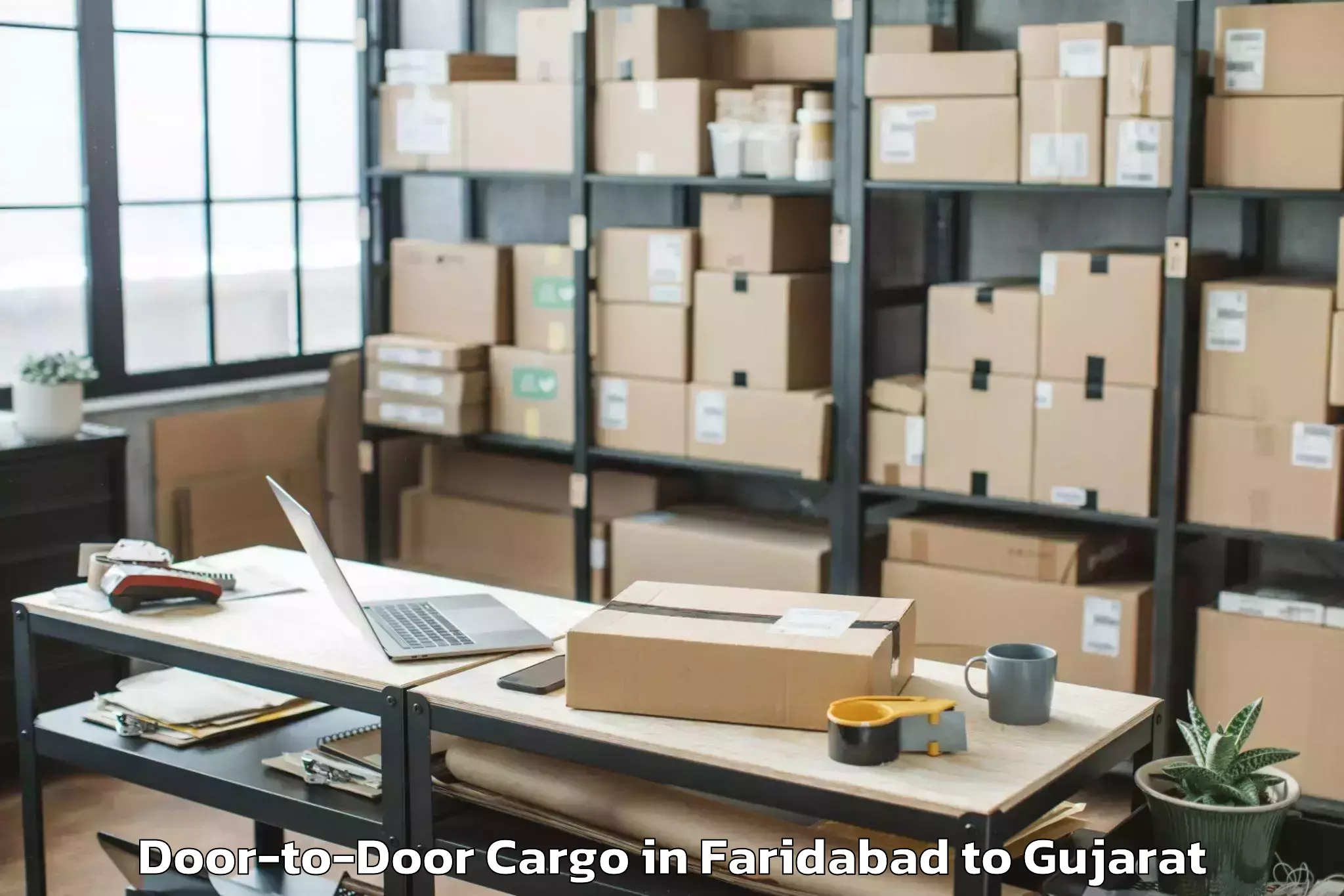 Affordable Faridabad to Abrama Door To Door Cargo